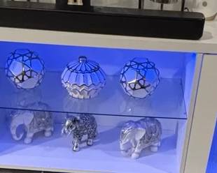 Modern TV stand with blue LED lighting