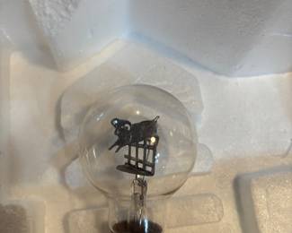 lamb jumping a fence light bulb
