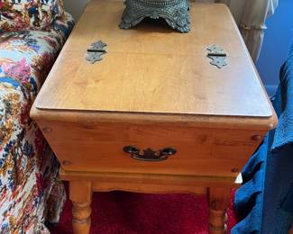 One of two matching Colonial-style side tables.