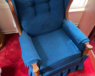 One of two matching vintage armchairs with striking blue upholstery, both in very good condition.