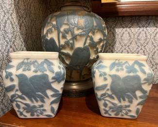 Vintage Phoenix Consolidated Glass "Lovebirds" art deco molded glass lamp and two vases in a blue and white relief design featuring pairs of birds.