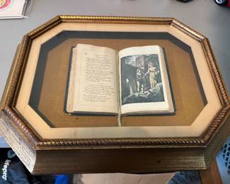19th-century poetry book with hand-colored illustrations, framed.