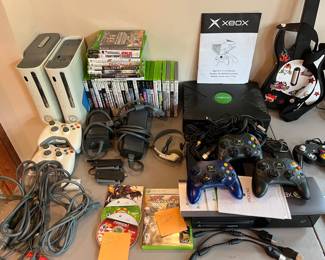 Large selection of XBOX consoles, games, and accessories.
