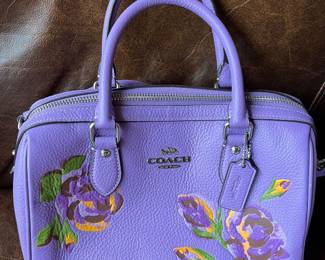 Coach Rowan satchel with rose print pebble leather.