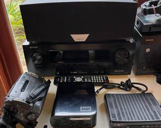 Large selection of electronics, including this Integra DTR-50.6 receiver, a Denon integrated network AV receiver (AVR-X3500H), a Jamo  E 8CEN.2 center channel speaker, and more.