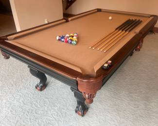Brunswick pool table in excellent condition. Diamond-honed slate, Glenwood matte black, manufactured in 2017.