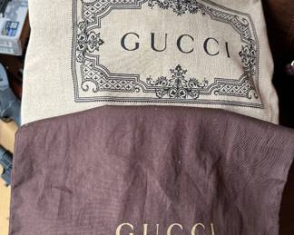 Gucci dust bags.