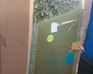 Christmas tree still in a box