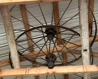 Metal wagon wheels - we are taking them down from the rafters for your home decor!