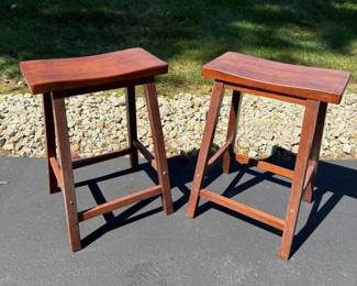 081 pairofwoodsaddleseatstoolsinconte