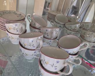 Tea cups with matching plates