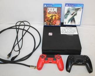Sony Playstation 4 PS4, 2 controllers, comes with doom eternal, Final Fantasy VII newmake (has cigarette smoke smell)