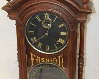 1800's Fashion #6 Seth Thomas Clock with black face, walnut case, double dial, calendar clock 33" tall