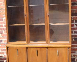 MCM Cerama by Broyhill walnut China Cabinet This is a mid-century modern two-piece wood hutch featuring arched glass cabinet doors on top and a matching sideboard buffet base with brass-accented hardware.
