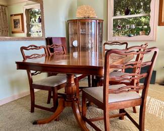 $600 Century Furniture Company Double Pedestal Dining Table #943 Top, Includes 6 Chairs, 3 Table Leaves, and a Table Pad. Table is Duncan Phyfe Style. Chairs are Chippendale Ribbon Ladderback design