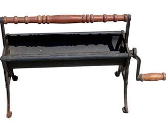 744 - Vintage Cast Iron Newspaper Log Roller (Description): 14 x 25 x 10
