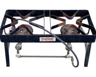 799 - Bayou Classic Propane Double Burner (Description): 12.5 x 29 x 8 Used as is electric/electronic/mechanical item. No guarantee all components, untested.
