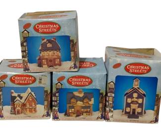 665 - 4 Christmas Streets Lighted Houses in boxes (Description): Used as is electric/electronic/mechanical item. No guarantee all components, untested.