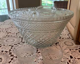 Punch bowl with many cups and ladle