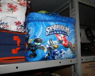 Skylanders figures and carry cases
