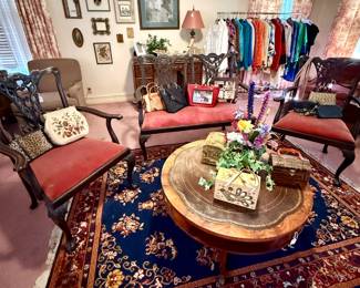 Velvet covered seating atop a gorgeous rug