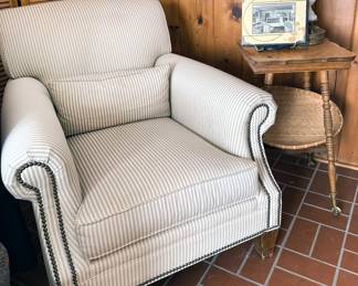 Oversized armchair; Tiger oak 2-tier parlour table with bobbin legs