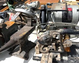 Assorted anvils, vises, tools