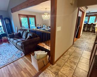 Dining room, kitchen, and outdoor deck access this way.