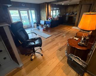 BASEMENT: stairs are to the left, past the stairs to upstairs. Access to the back is located on this level.