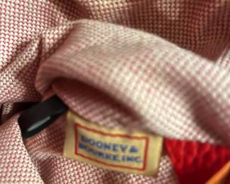 #197 Dooney & Bourke Red Leather Shoulder Bag. J6740836 Excellent Exterior Condition. Slight Staining on Bottom of Interior $45.00