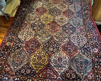 #144 Machine made rug 6x9, Sears Rust, Sage and Navy w waffle pad $80.00