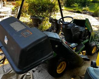 #5 John Deere Riding Mower (top has crack and seat has ripped tires flat) does run STX38 - has bagger - 38" Cut $550.00