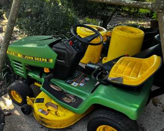 #5 John Deere Riding Mower (top has crack and seat has ripped tires flat) does run STX38 - has bagger - 38" Cut $550.00