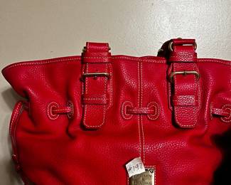 #197 Dooney & Bourke Red Leather Shoulder Bag. J6740836 Excellent Exterior Condition. Slight Staining on Bottom of Interior $45.00