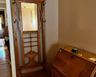 #82 Antique Hall Tree w/5 Hooks (missing one hook) w/Bench Seat and Mirror - has wood carving on top - 28Wx14Dx80T $175.00