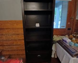 Beautiful black wood shelves with lower drawer 