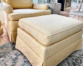 Vintage arm chair with ottomam