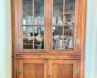 $300 mahogany corner cabinet