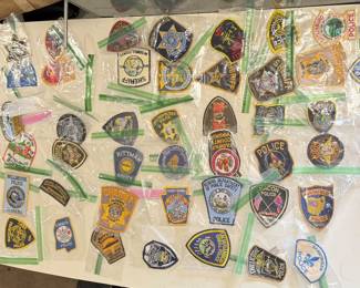 FullSizeRender collection of over 50 police and sheriffs patches