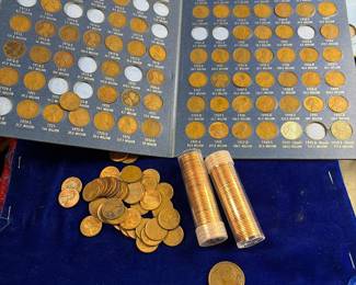 Collection of pennies, including two rolls of the last of the pennies