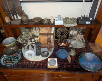 bronze and wood  figurines, enamel bowls, pottery