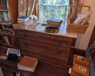 marble dresser, books