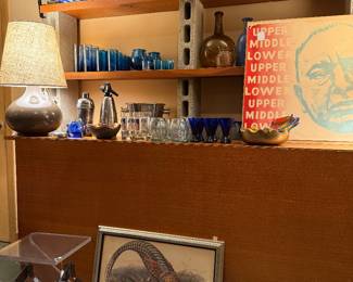 Mexican hand blown glassware. Blenko vase. James Rosenquist lithograph. Robert Abbey lamps.