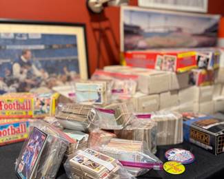 Baseball, basketball and football cards.