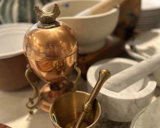 Copper egg muddler. Assorted mortar and pestles