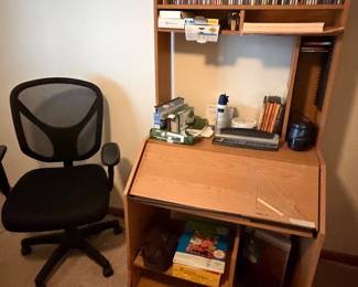 writing desk, CDs, desk chair