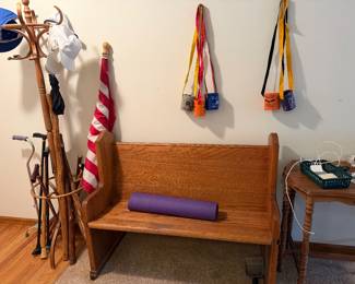 church pew table and walking sticks and canes