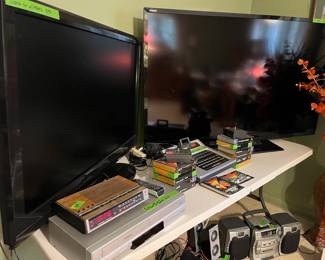 Two Large Flat-Screen TVs