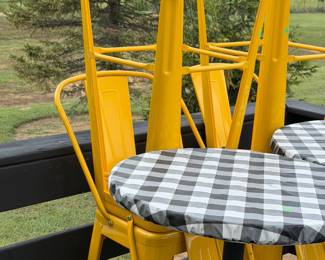 Pub tables and metal bar stools