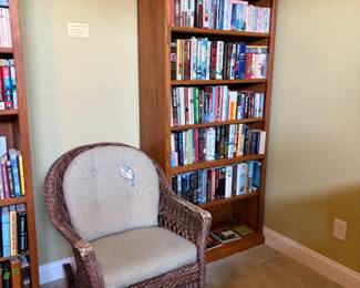 rocker, oak bookshelves, books